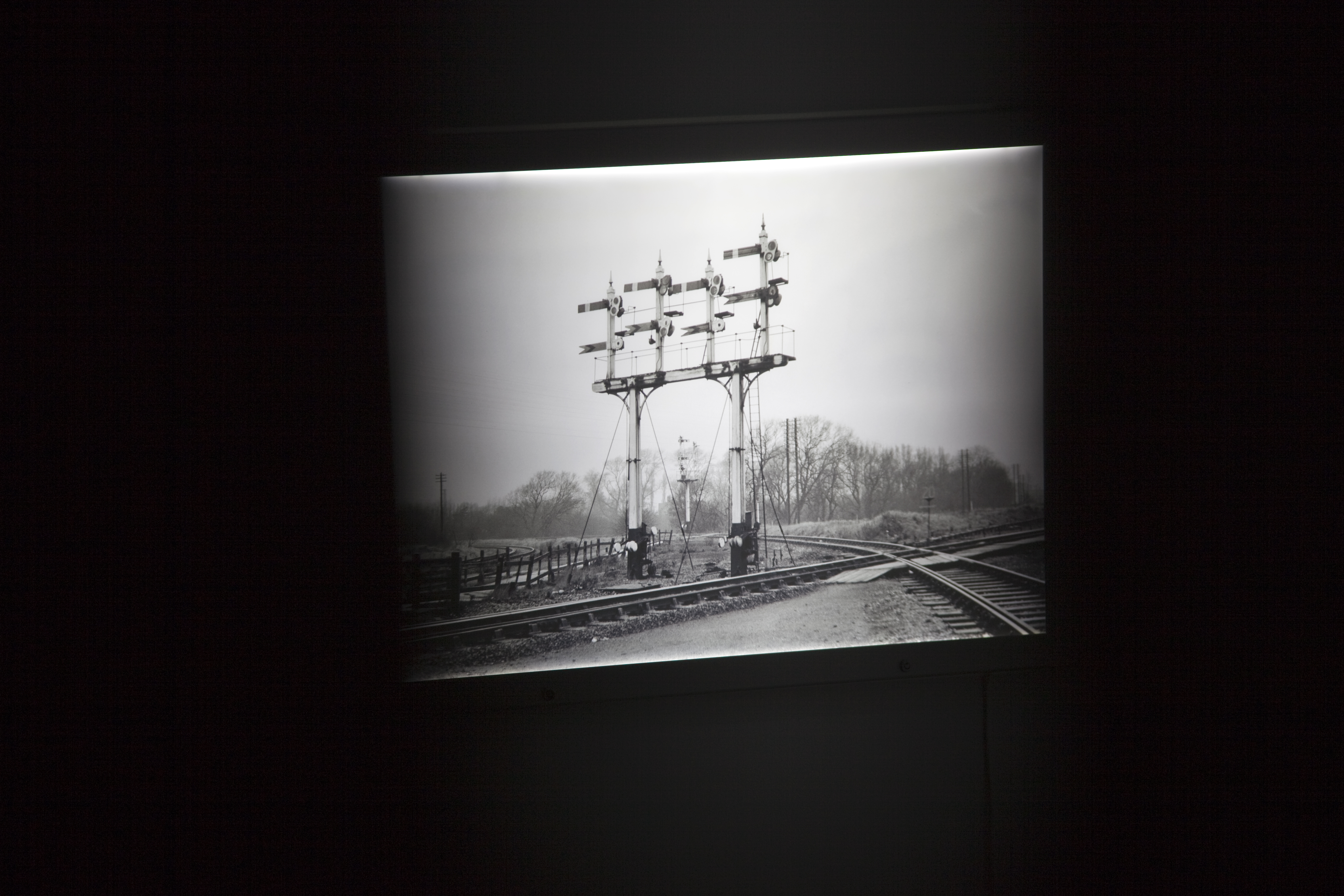A black and white photograph of railway infrastructure.