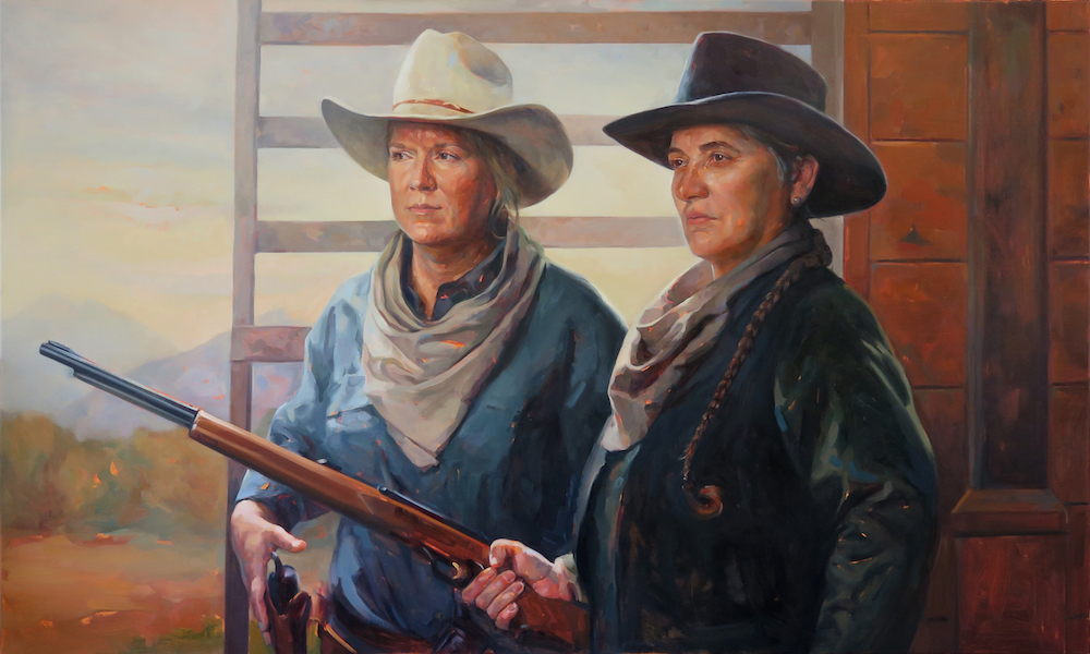 An oil on canvas painting of two women standing together, they are cowboys as indicated by their hats, neckerchiefs and clothing. One holds a gun in her hand, the other reaches for her pistol in her belt holster.