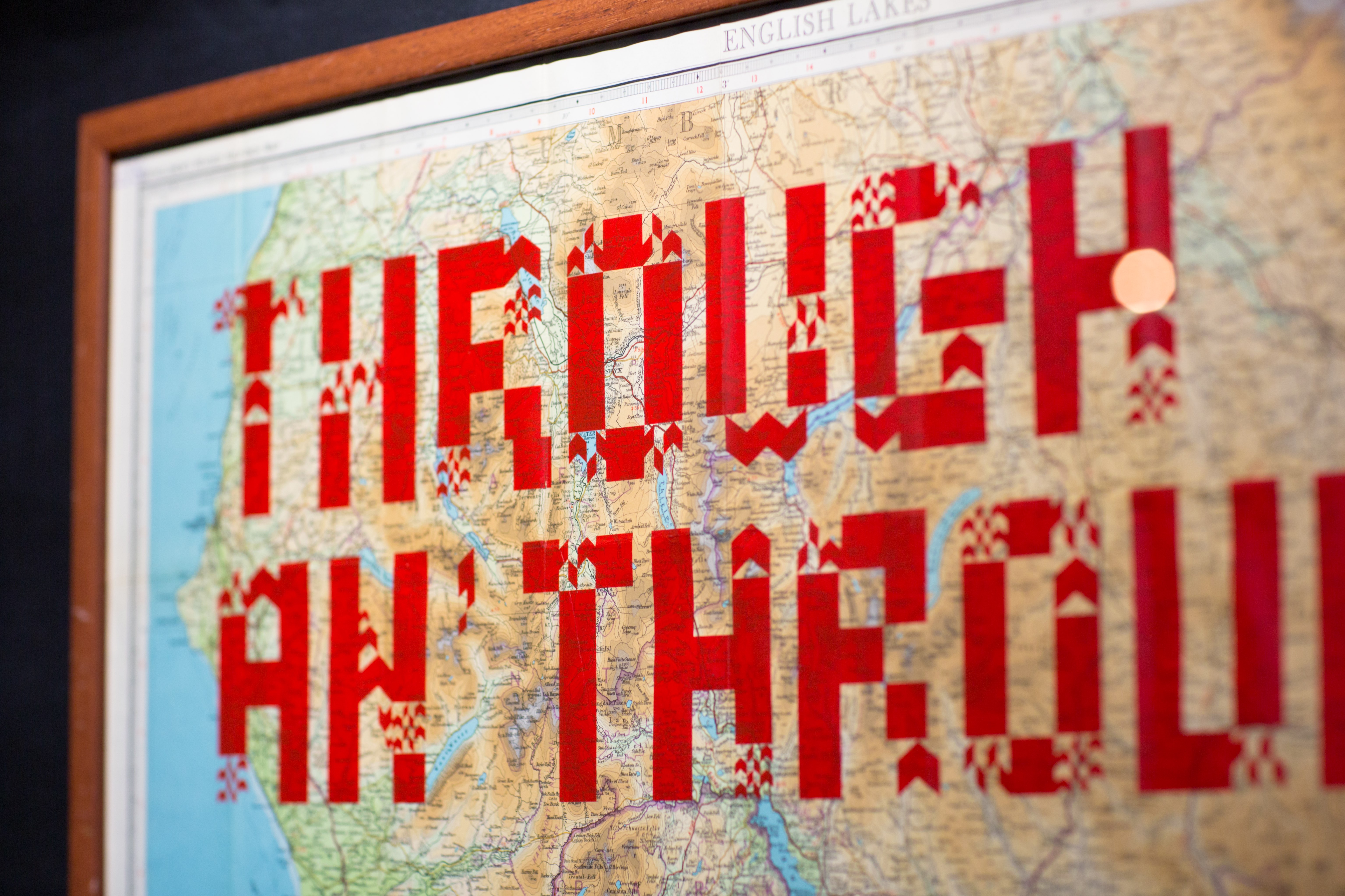 A framed map overlaid with red text that reads: 'through an through'
