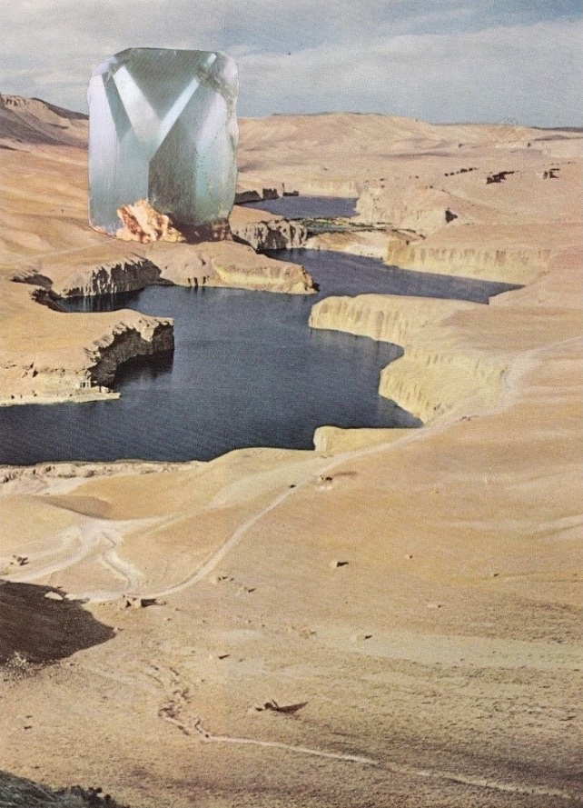 An image of a national park with sand and water. Collaged into the image is a large silver metal structure, giving the impression of a building or a spaceship just landed.