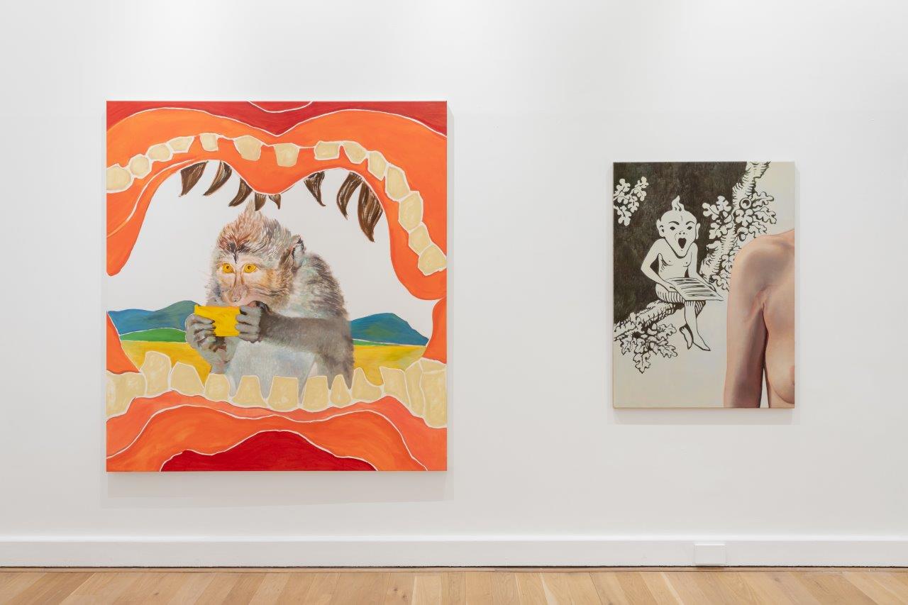 Two paintings hanging beside one another in a gallery space. On the left, the painting depicts a monkey eating fruit, framed by mouth and gums. The second painting depicts an illustration of elf painted only in black, and a realistic shoulder and upper arm in the foreground.