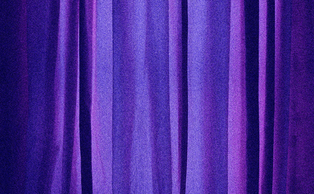 A pleated purple fabric like a curtain