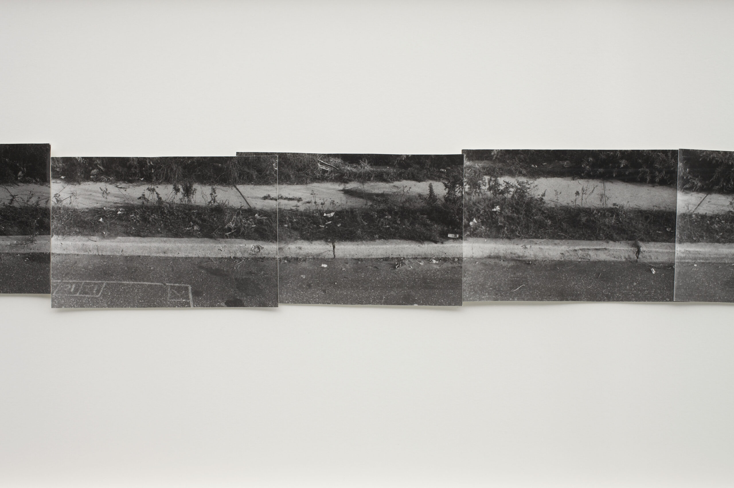 Detail from the Gordon Matta-Clark work 'Jamaica Curb' from his series Fake Estates.