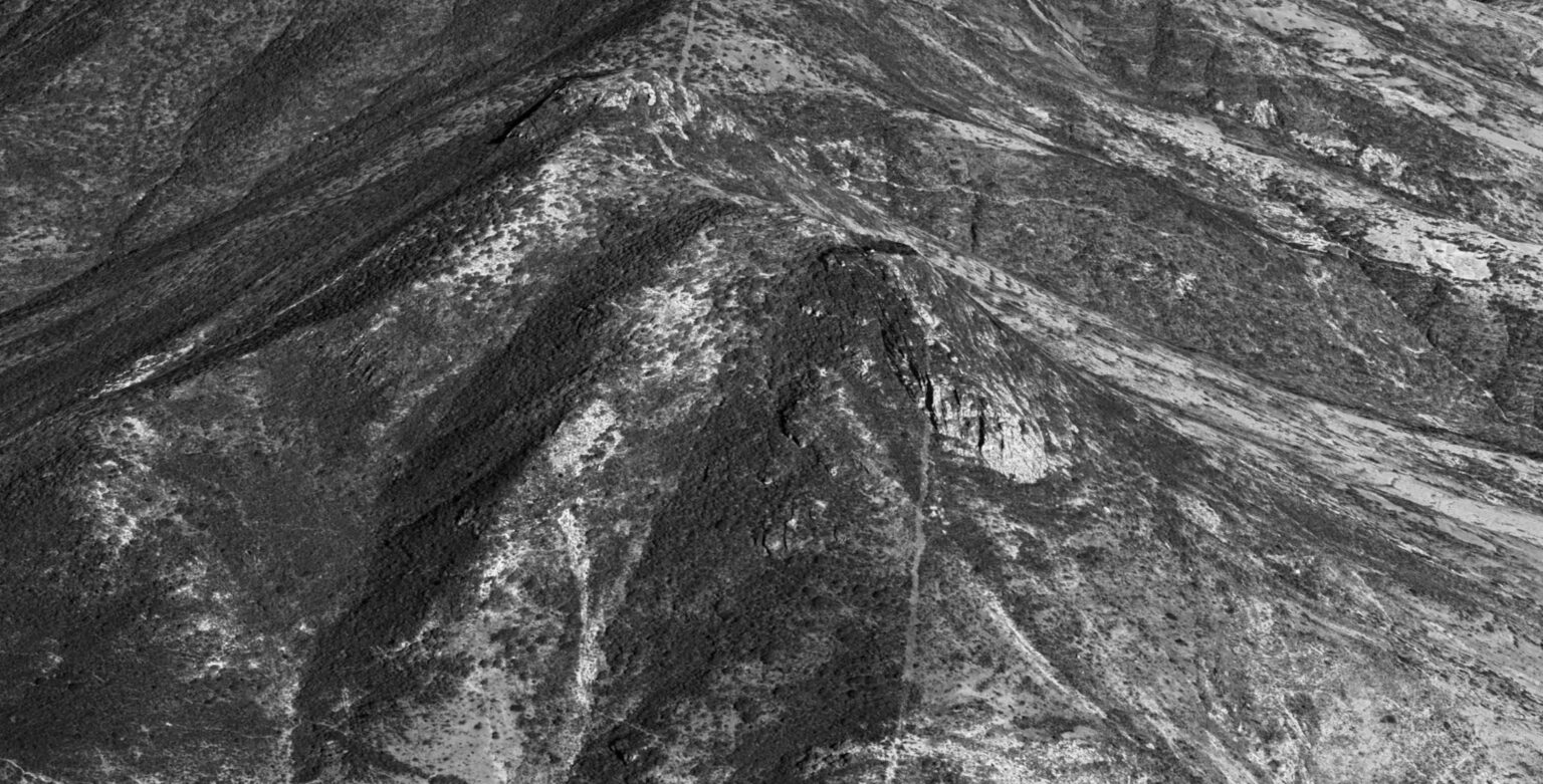 Greyscale image of a mountainside in Mexico.